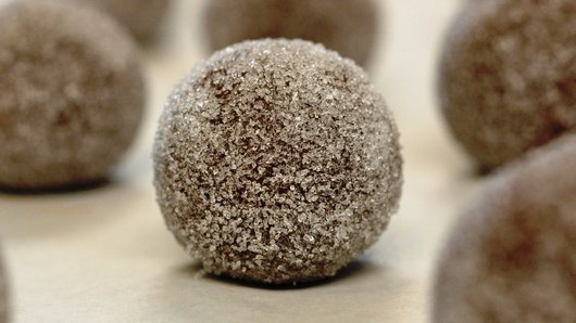 Rolling the Cookies in the Sugar
