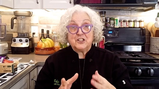When boiling soaked garbanzo beans, a white foam forms on top at first, should I skim the white foam that forms on top off, or mix it in with the rest of the water?