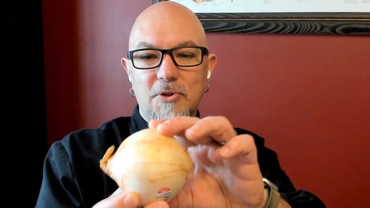 What is the correct way to cut an onion and a mango?