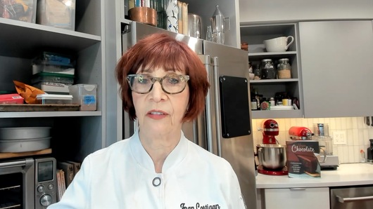 Using a Ganache Glaze on a cake, you do a crumb coat first, then a top layer. How many layers could you do if those two layers don't cover the cake adequately? Or is the glaze too thick?