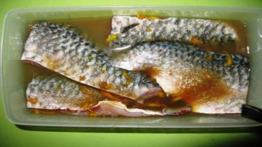 Cooking and serving the fish.